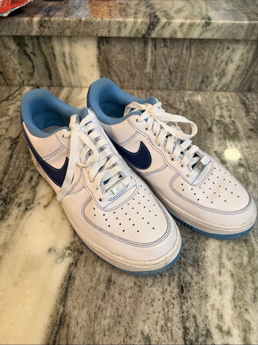 Nike Air Force 1 White Leather Sneakers with Navy Swoosh and Light Blue Lining